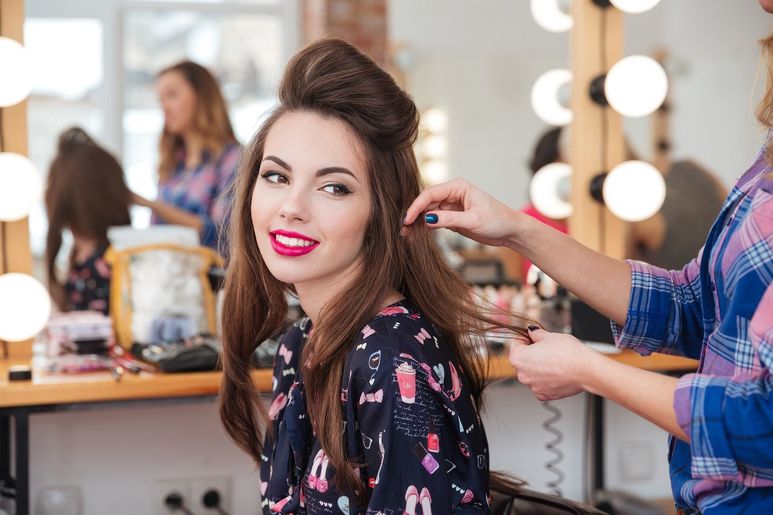 woman having hair styled